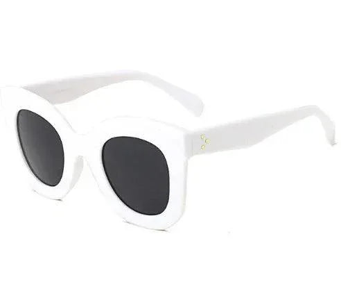 White cat-eye sunglasses with black lenses, stylish women's fashion eyewear