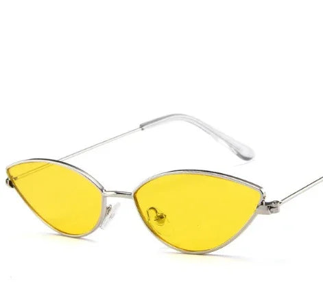 Cat eye sunglasses with yellow tinted lenses and thin silver metal frames