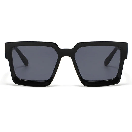 Black oversized square sunglasses with thick frames and dark lenses on white background