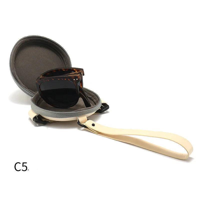 Tortoiseshell sunglasses in gray case with cream strap, stylish daily wear eyewear