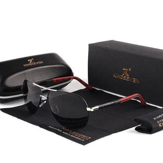 Stylish aviator sunglasses with red and silver frames, displayed with case and cleaning cloth