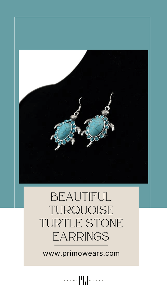 Pair of turquoise stone turtle-shaped dangle earrings on black background