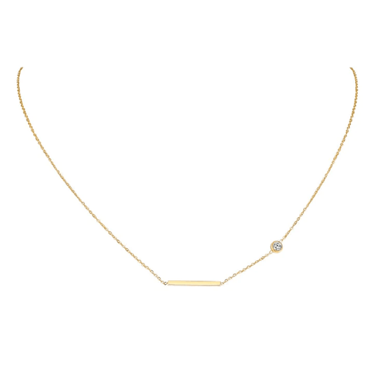 Delicate gold chain necklace with a horizontal bar pendant and a small round diamond accent