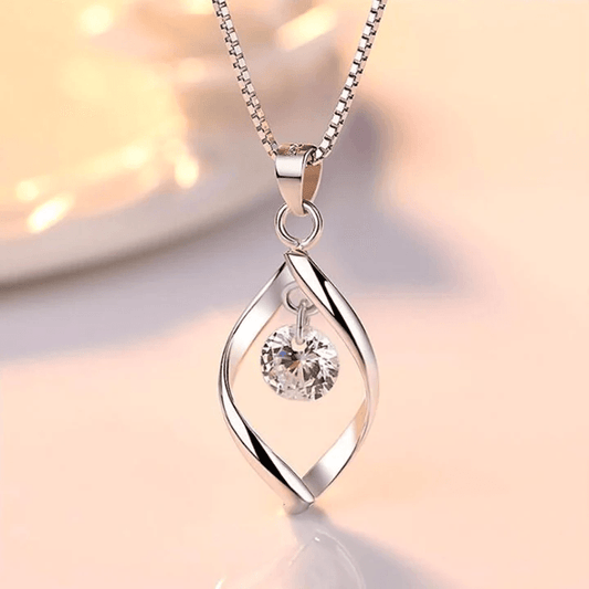 Elegant silver geometric pendant necklace with a sparkling round cubic zirconia centerpiece