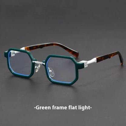 Green octagonal frame eyeglasses with tortoiseshell temples on a dark surface