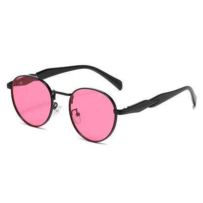 Round black frame sunglasses with pink tinted lenses and nose pads on white background