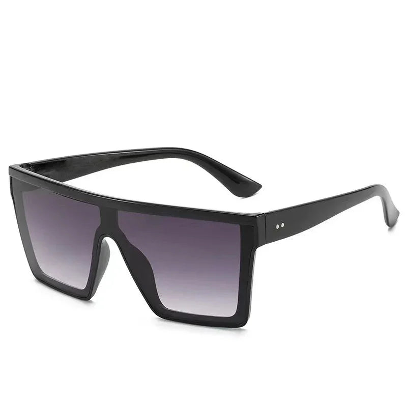modern oversized rectangular black sunglasses with gradient dark lenses on white background
