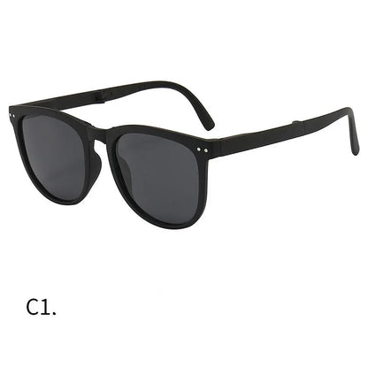Classic black wayfarer style sunglasses with dark tinted lenses and subtle metallic rivets