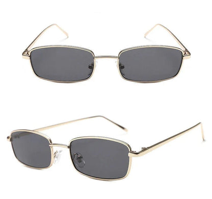Rectangular black lens sunglasses with thin gold metal frame and nose pads
