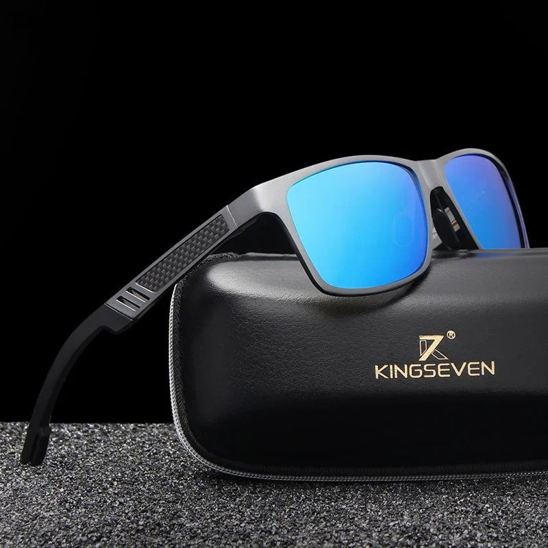 Modern sunglasses with blue mirrored lenses on black textured surface and black leather case