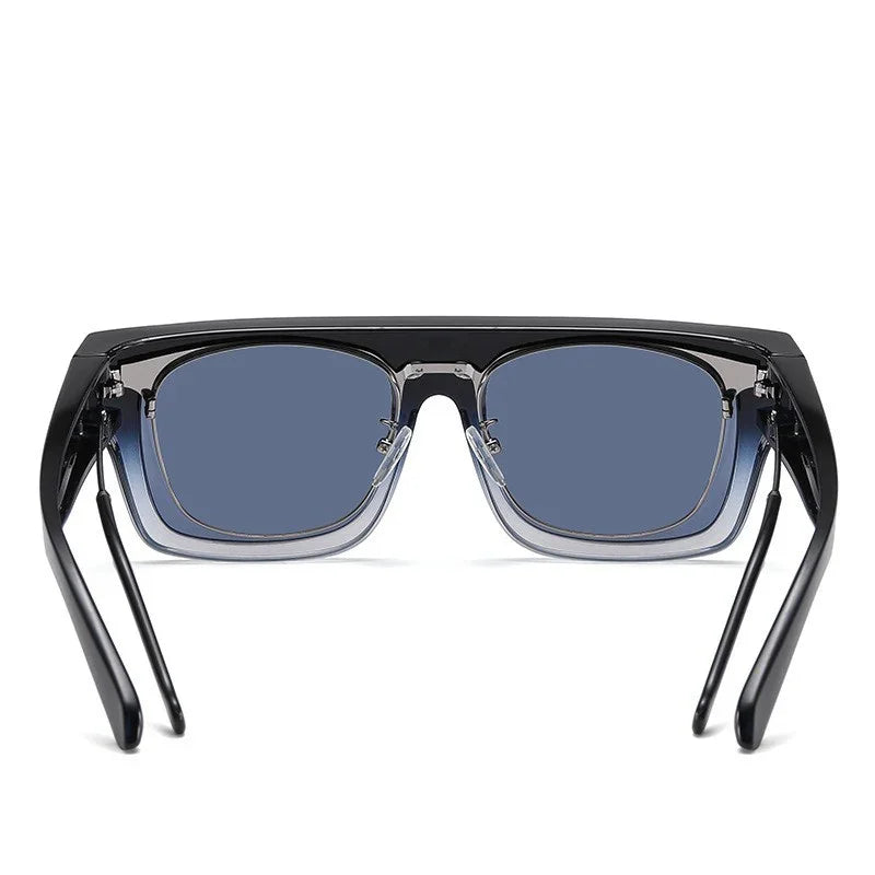 Stylish black square frame sunglasses with blue tinted lenses and clear inner rims