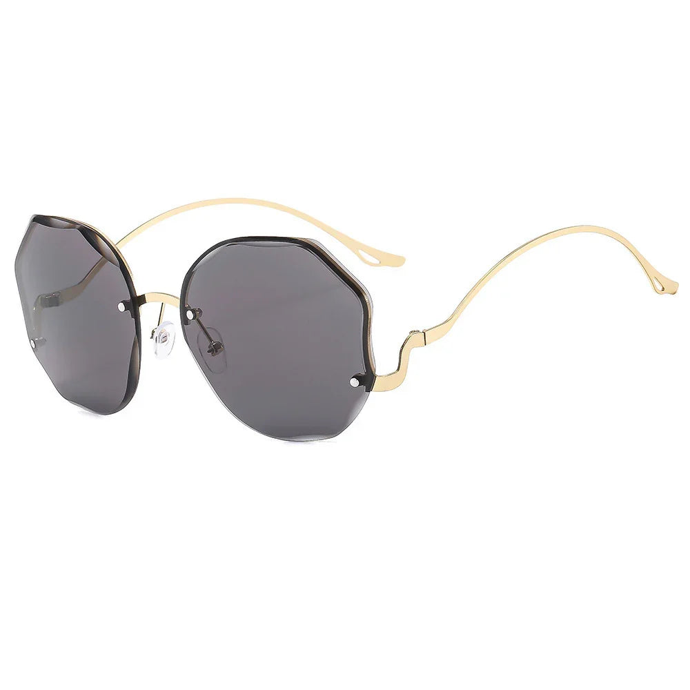 Fashionable geometric dark lenses sunglasses with thin gold metal frame and curved temples
