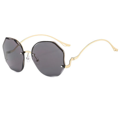 Fashionable geometric dark lenses sunglasses with thin gold metal frame and curved temples