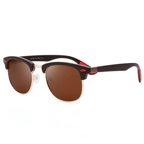 Stylish half-rim sunglasses with brown lenses and black-red frames on white background