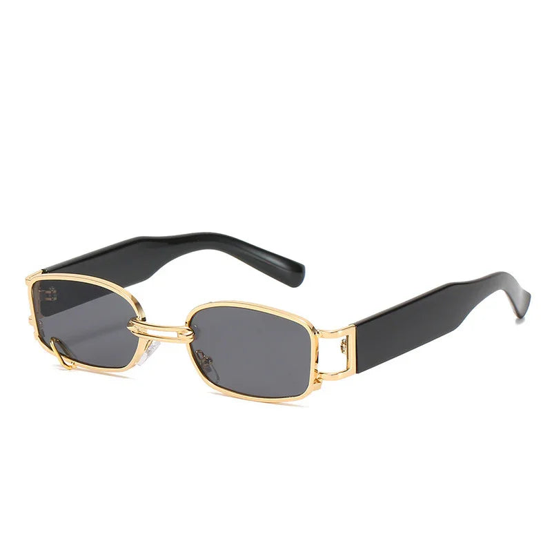 Rectangular black sunglasses with gold metal frame and thick black temples on white background