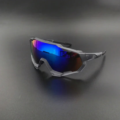 Futuristic sports sunglasses with mirrored blue and purple lens on black background