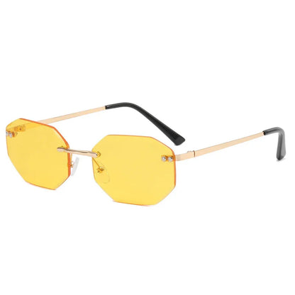 Rimless octagon yellow tinted sunglasses with gold metal temples and black earpieces