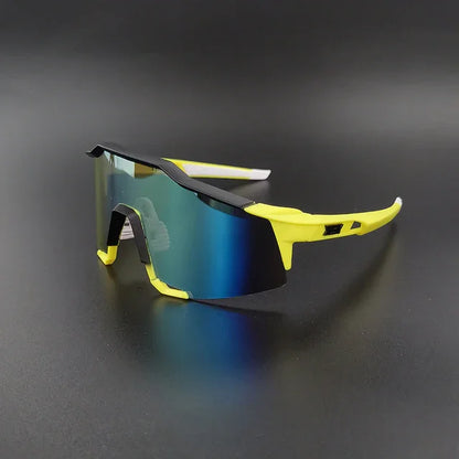 Yellow sports sunglasses with blue mirrored lenses on a black background