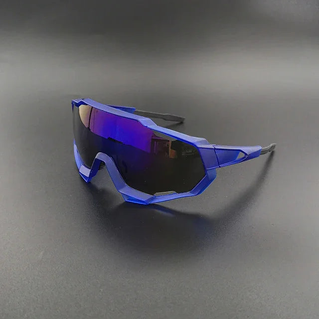 Blue futuristic sports sunglasses with mirrored lenses on a dark background