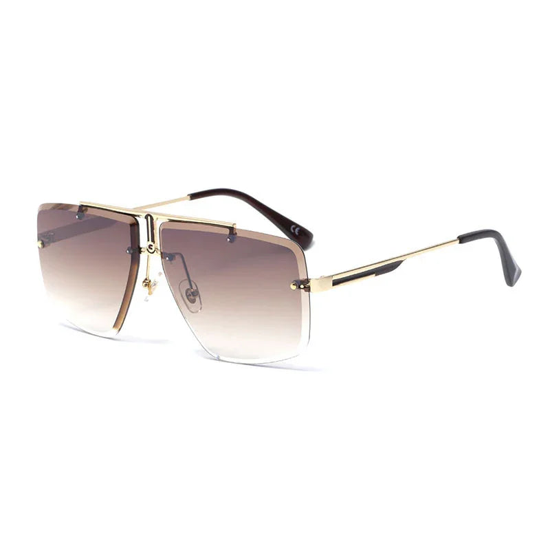 Square oversized sunglasses with gradient brown lenses and thin gold metal frames on white background