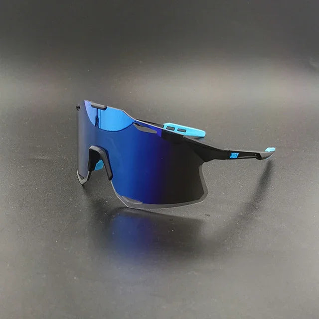 Sport sunglasses with blue mirrored lens and black frame on a dark background