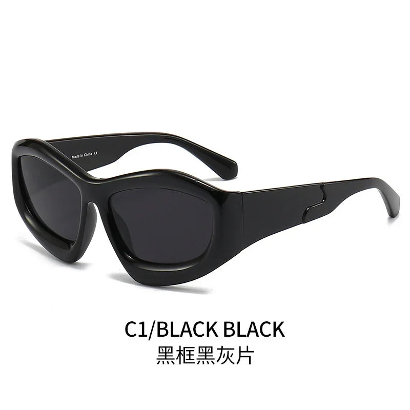 Black oval sunglasses with thick frame on white background, labeled C1/BLACK BLACK.