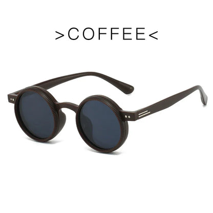 Round coffee-colored sunglasses with dark lenses and textured frames on white background