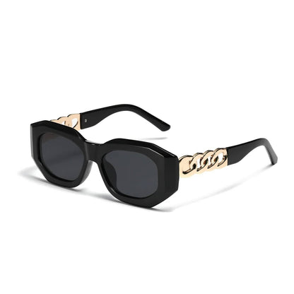 Black oversized geometric sunglasses with gold chain-link accents on temples