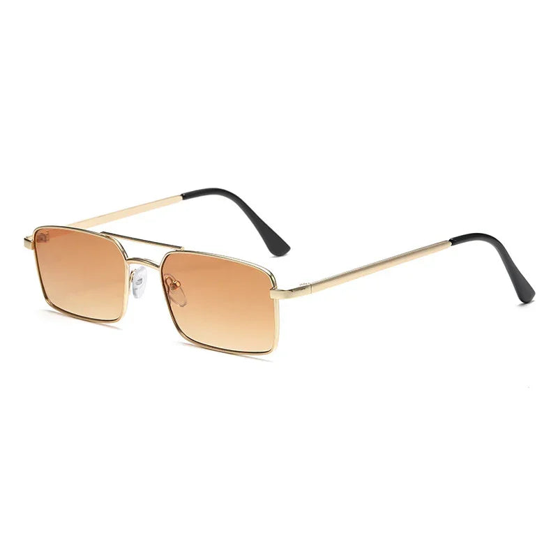 Gold frame sunglasses with brown gradient rectangular lenses and black temple tips on white background