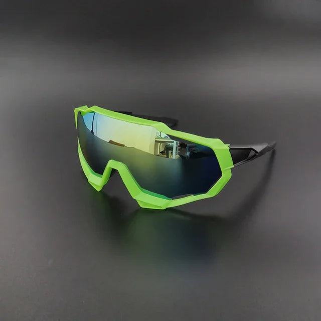 Futuristic green mirrored sports sunglasses with black arms on a dark background