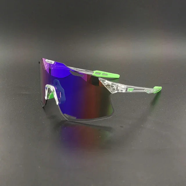 Futuristic sports sunglasses with purple mirrored shield lens and green accents on black background
