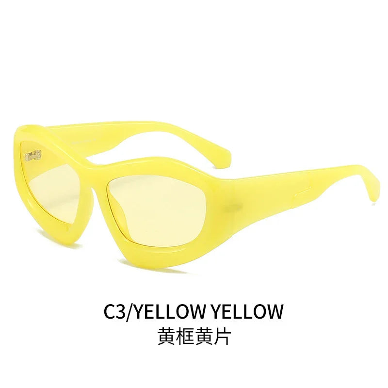 Yellow cat-eye sunglasses with tinted lenses on white background