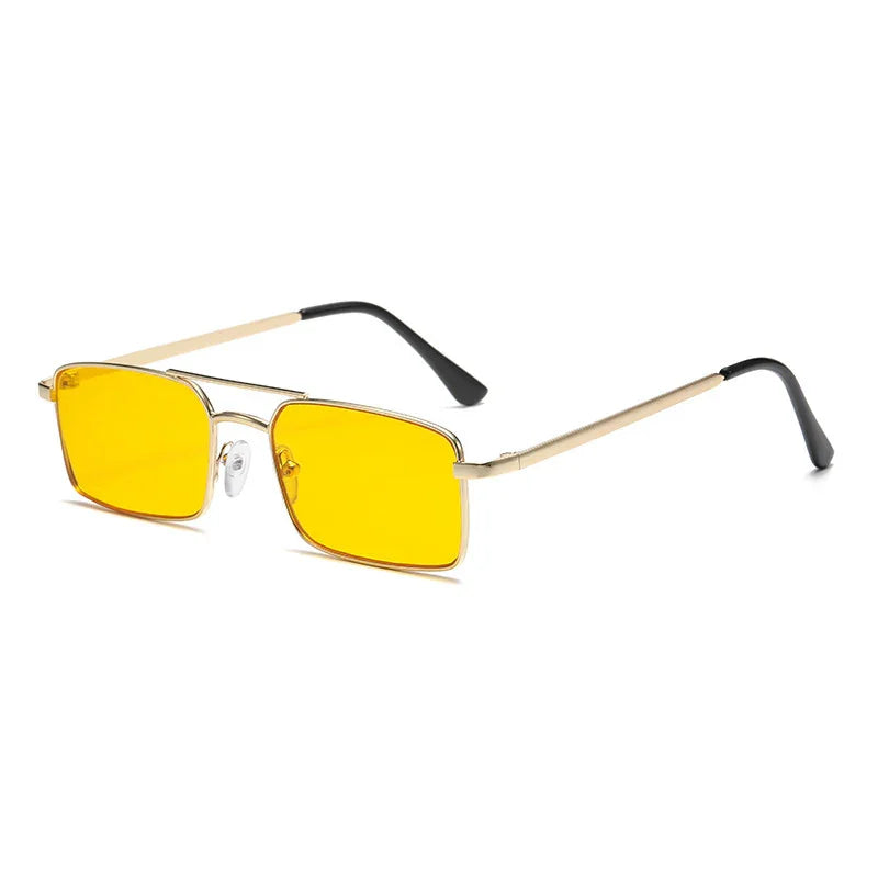 Rectangular yellow lens sunglasses with gold metal frame and black temple tips on white background