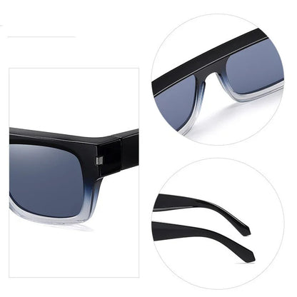 Close-up of stylish black and clear gradient sunglasses with dark lenses and angled temples