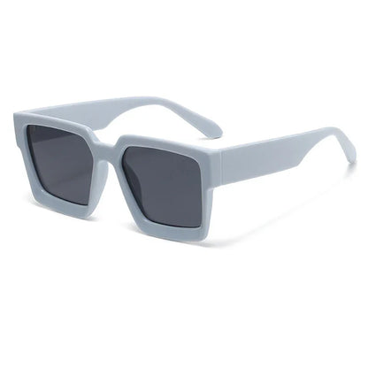 Trendy rectangular light gray sunglasses with dark tinted lenses and thick frame
