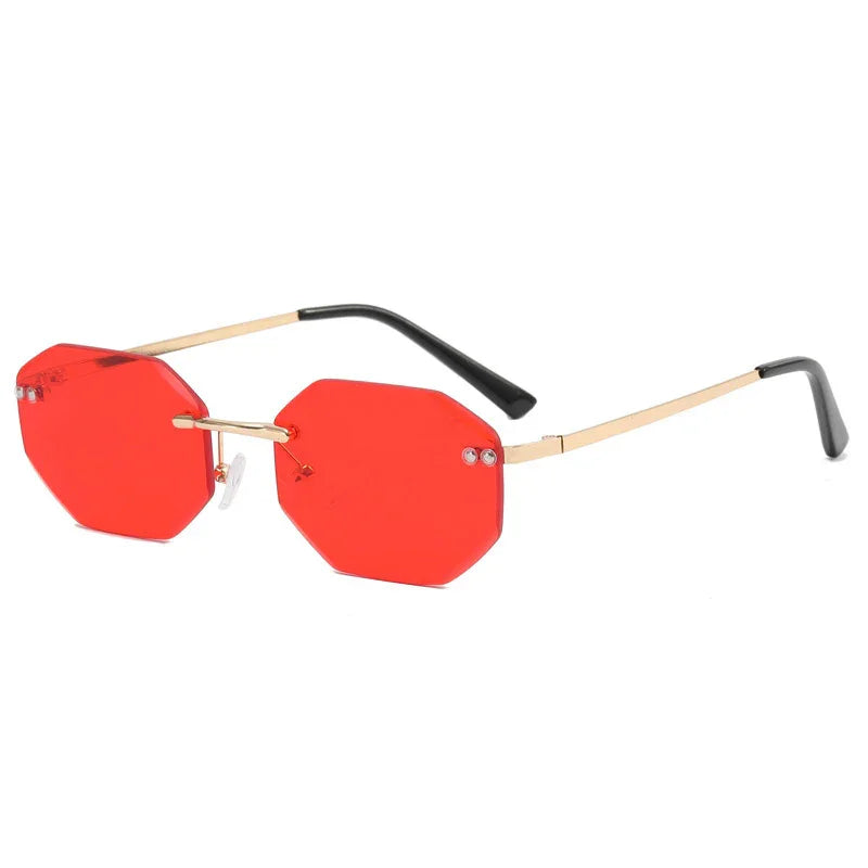 Octagonal red tinted rimless sunglasses with gold metal frame and black temple tips