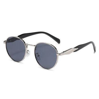 Round sunglasses with silver metal frame, dark lenses, and black temple arms