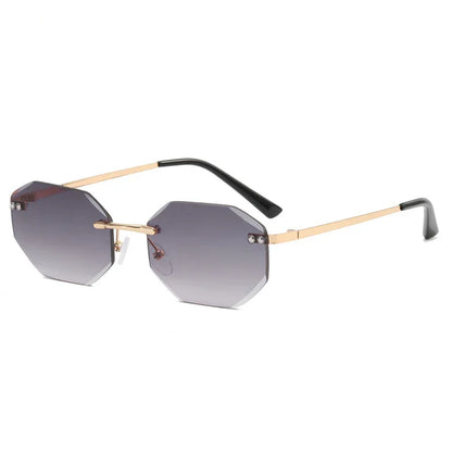 Octagon-shaped gray gradient lenses sunglasses with slim gold frames and black temple tips