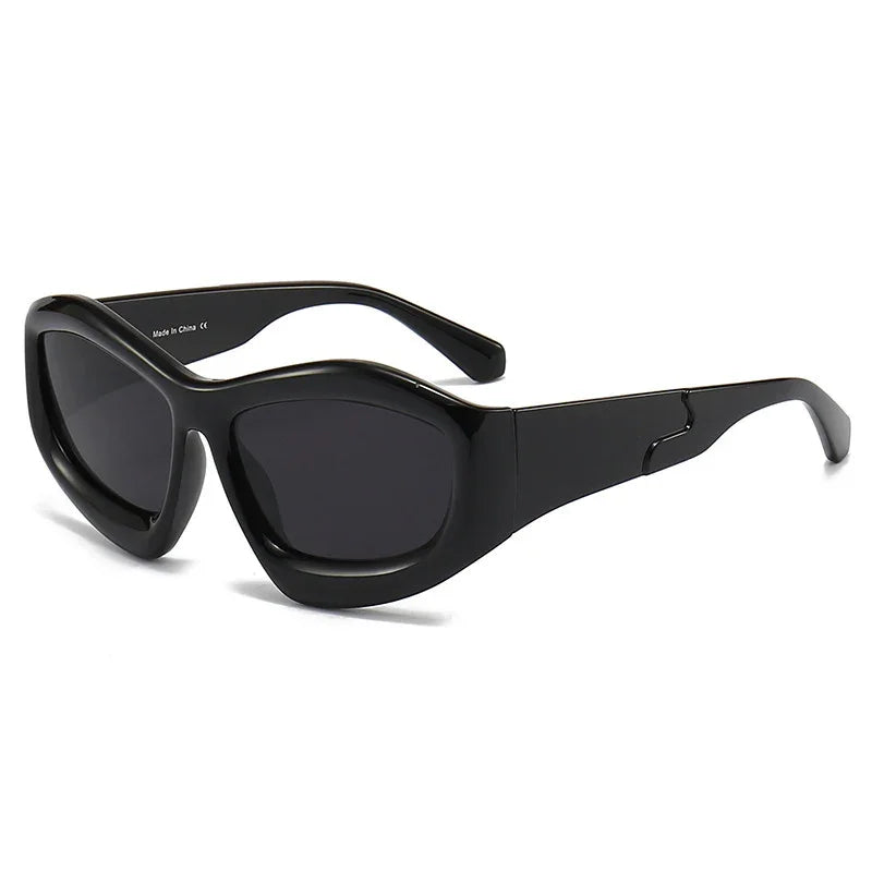 Chunky black oval sunglasses with thick frame and dark lenses on white background