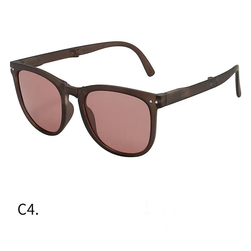 Brown translucent frame sunglasses with pink tinted lenses and rounded square shape