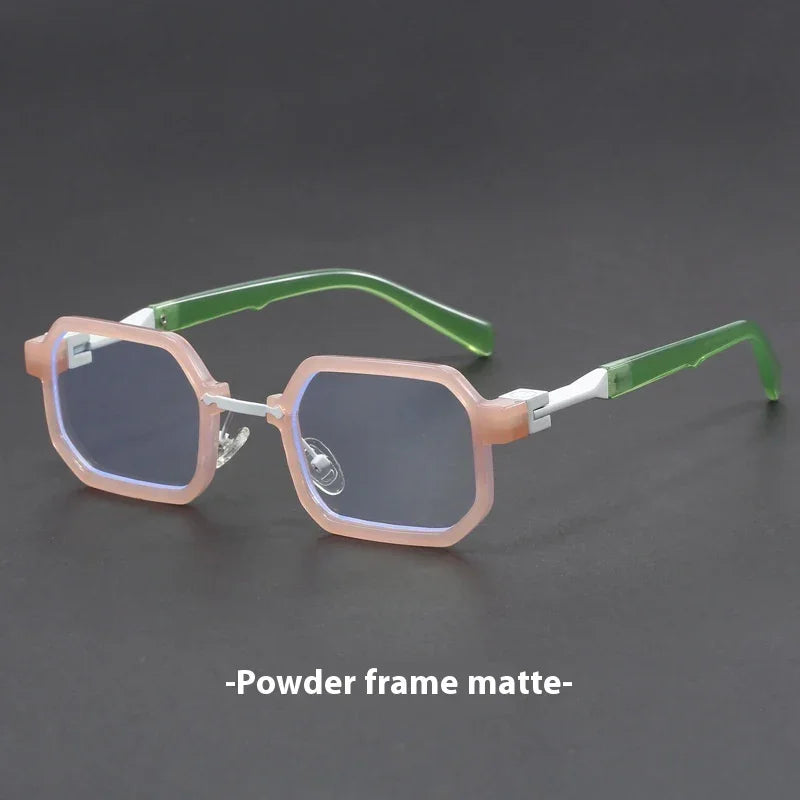 Matte octagonal eyeglasses with pink powder frame and green temples on dark background