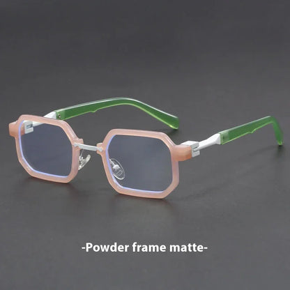 Matte octagonal eyeglasses with pink powder frame and green temples on dark background