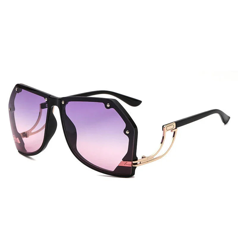 Black frame oversized sunglasses with purple to pink gradient lenses and gold metal temple accents