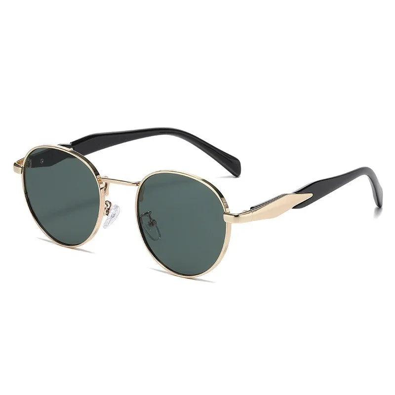 Round sunglasses with dark green lenses, gold metal frame, and black curved arms
