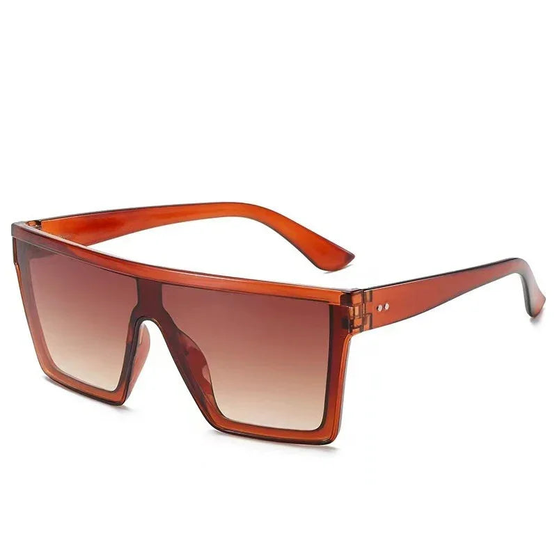 Brown translucent oversized square sunglasses with gradient brown lenses