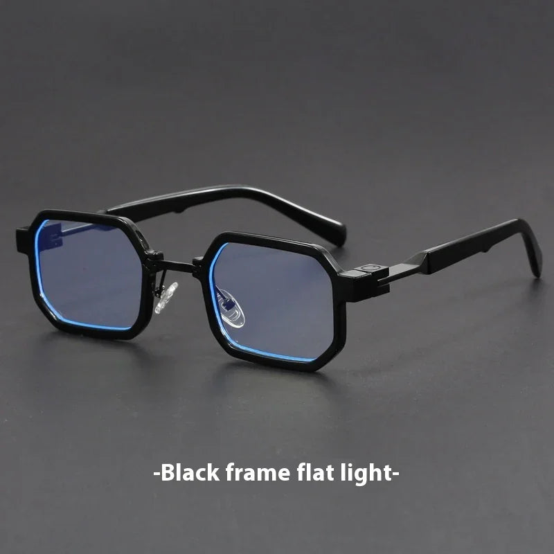 Black hexagonal frame glasses with blue-tinted lenses on dark background