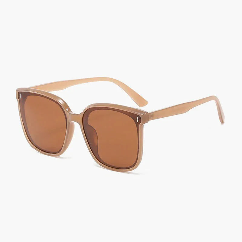 Light brown square frame sunglasses with brown tinted lenses on white background