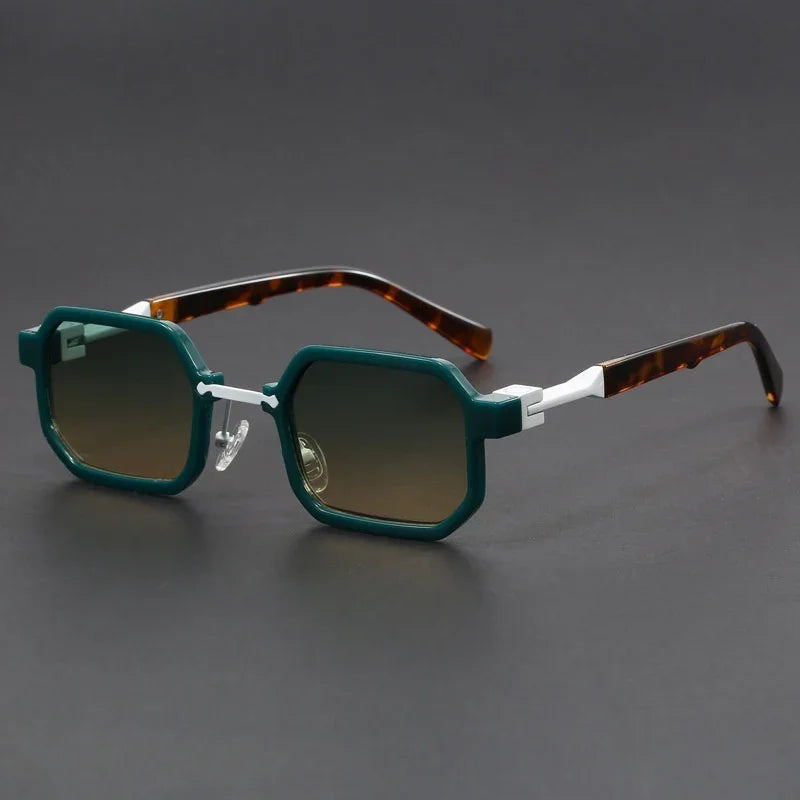 Geometric green-framed sunglasses with gradient lenses and tortoiseshell temples on gray background
