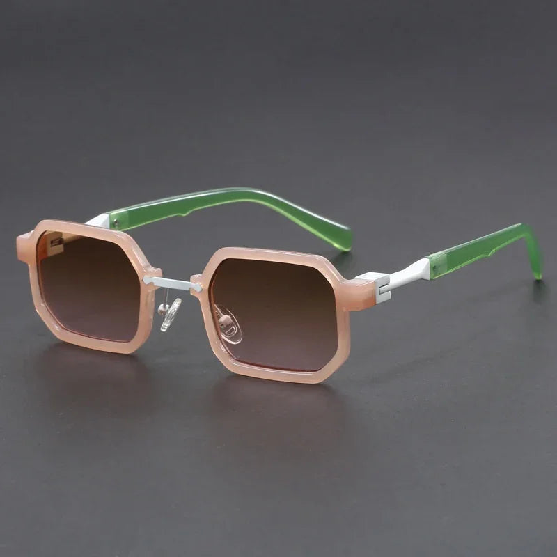 Fashionable sunglasses with pink octagonal frames, brown gradient lenses, and green temples