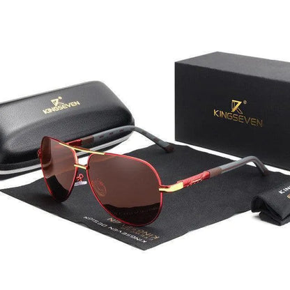 Red and gold aviator sunglasses with brown lenses displayed with black protective case and cleaning cloth